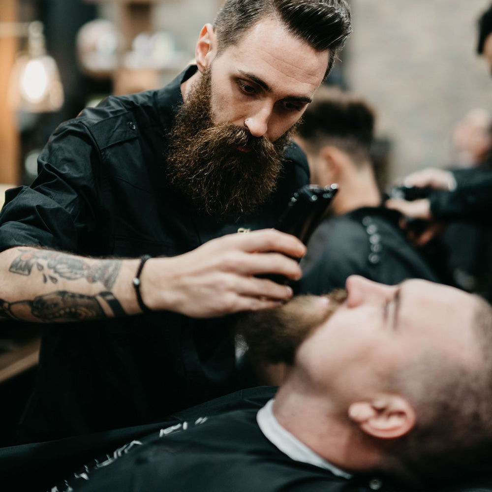 Beard sculpting for everyman, enjoy a hot towel shave & take some time to relax at Kingsmen Hair barbershops .